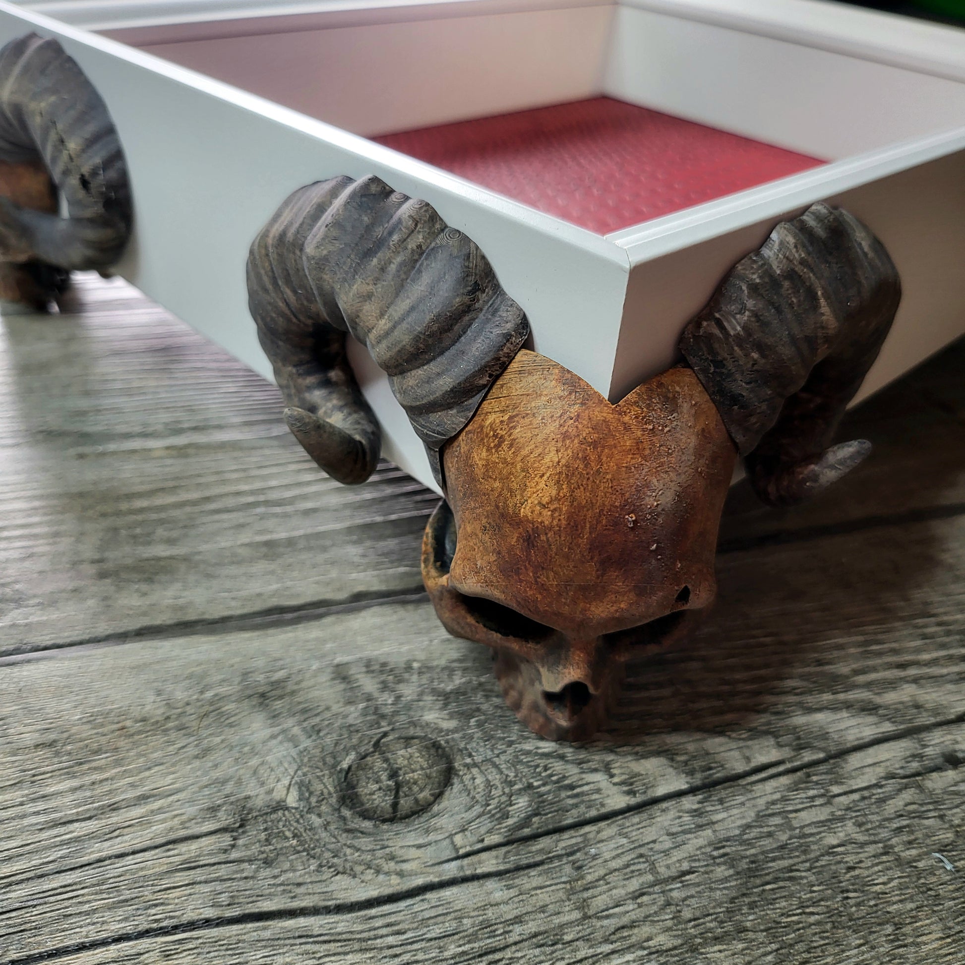Dice tray with skull feet for dice rolling for tabletop role playing board games