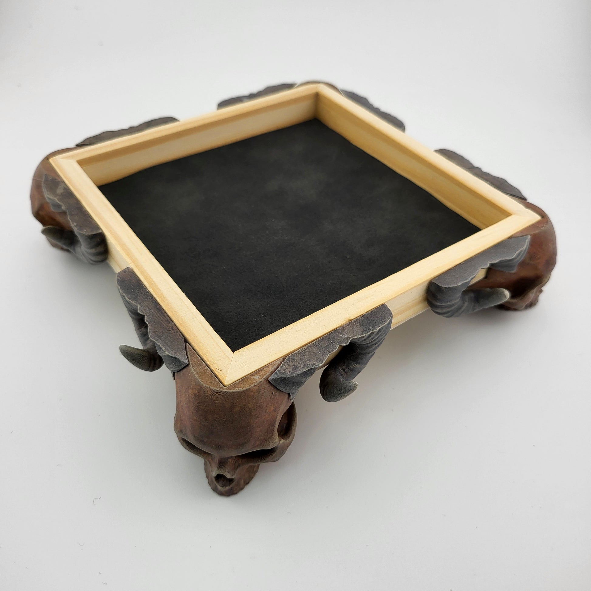 Dice tray with skull feet for dice rolling for tabletop role playing board games