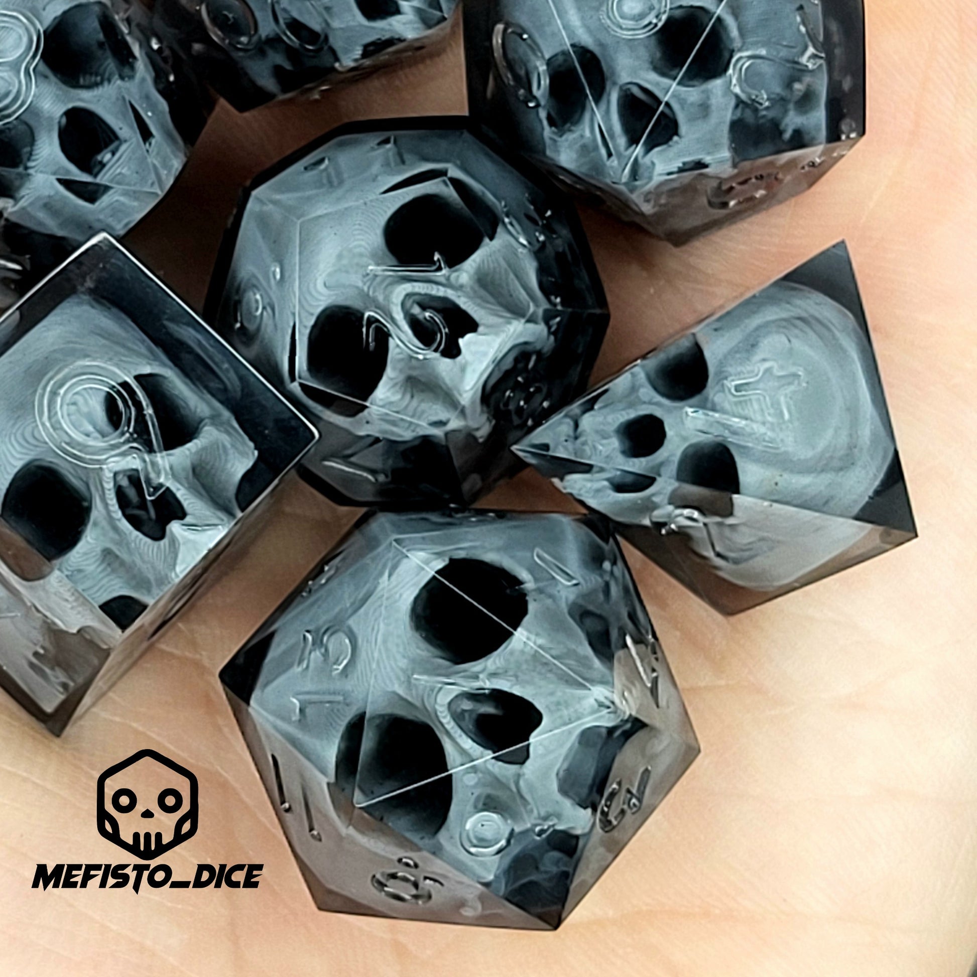 Black translucent polyhedral resin dice set with embedded red skulls inside, perfect for D&D (Dungeons & Dragons) and dark fantasy tabletop RPG campaigns