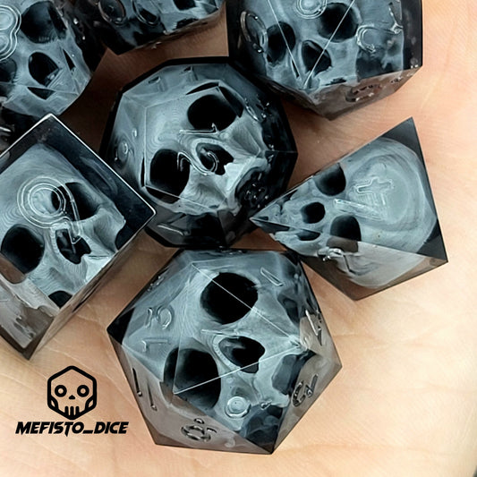 Black translucent polyhedral resin dice set with embedded red skulls inside, perfect for D&D (Dungeons & Dragons) and dark fantasy tabletop RPG campaigns