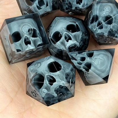 Black translucent polyhedral resin dice set with embedded red skulls inside, perfect for D&D (Dungeons & Dragons) and dark fantasy tabletop RPG campaigns