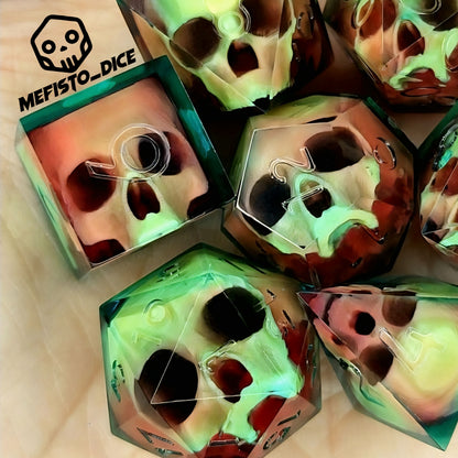 Handmade sharp edge resin dice set with floating skull design in transparent green and red resin