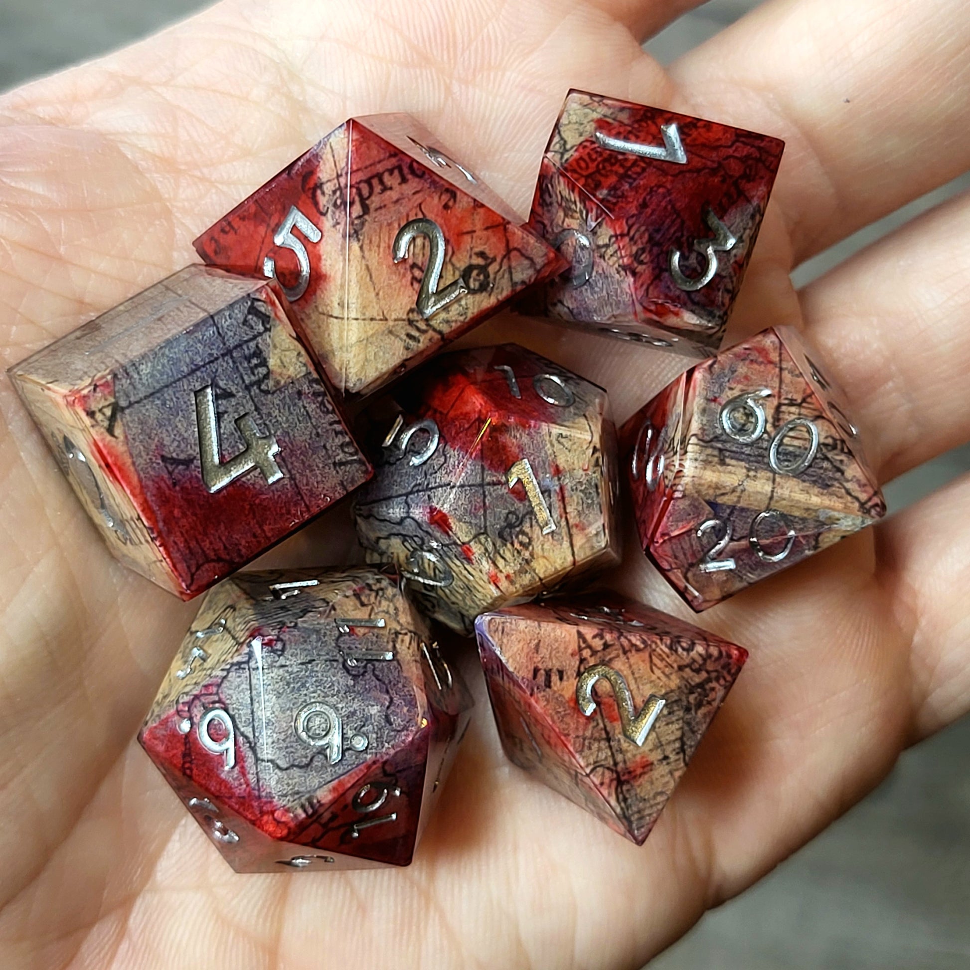 Dice set for dnd with a bloody map and silver numbers inside