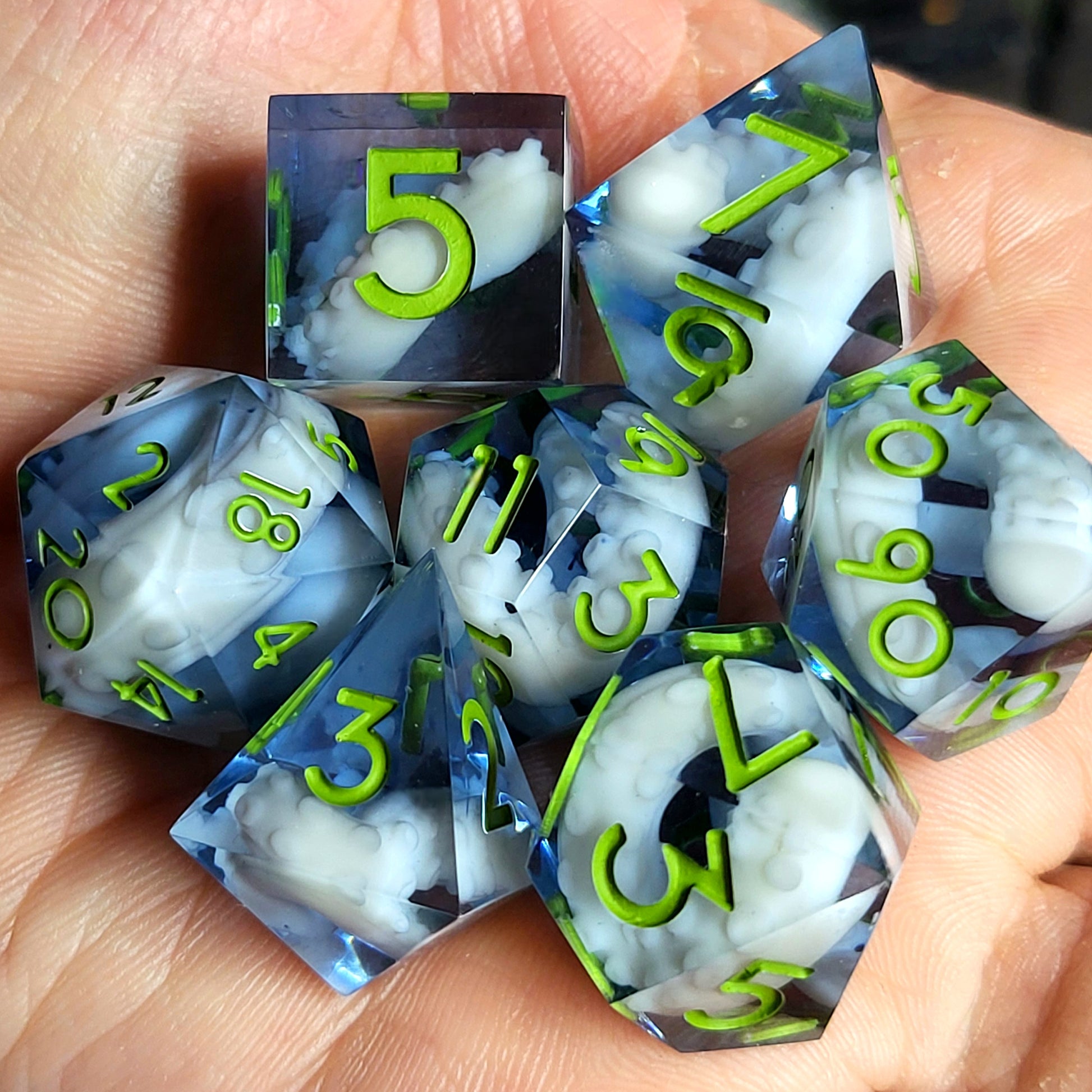 Dice set with white tentacles inside and green numbers for play dnd , dungeons and dragons and Call of Cthulhu