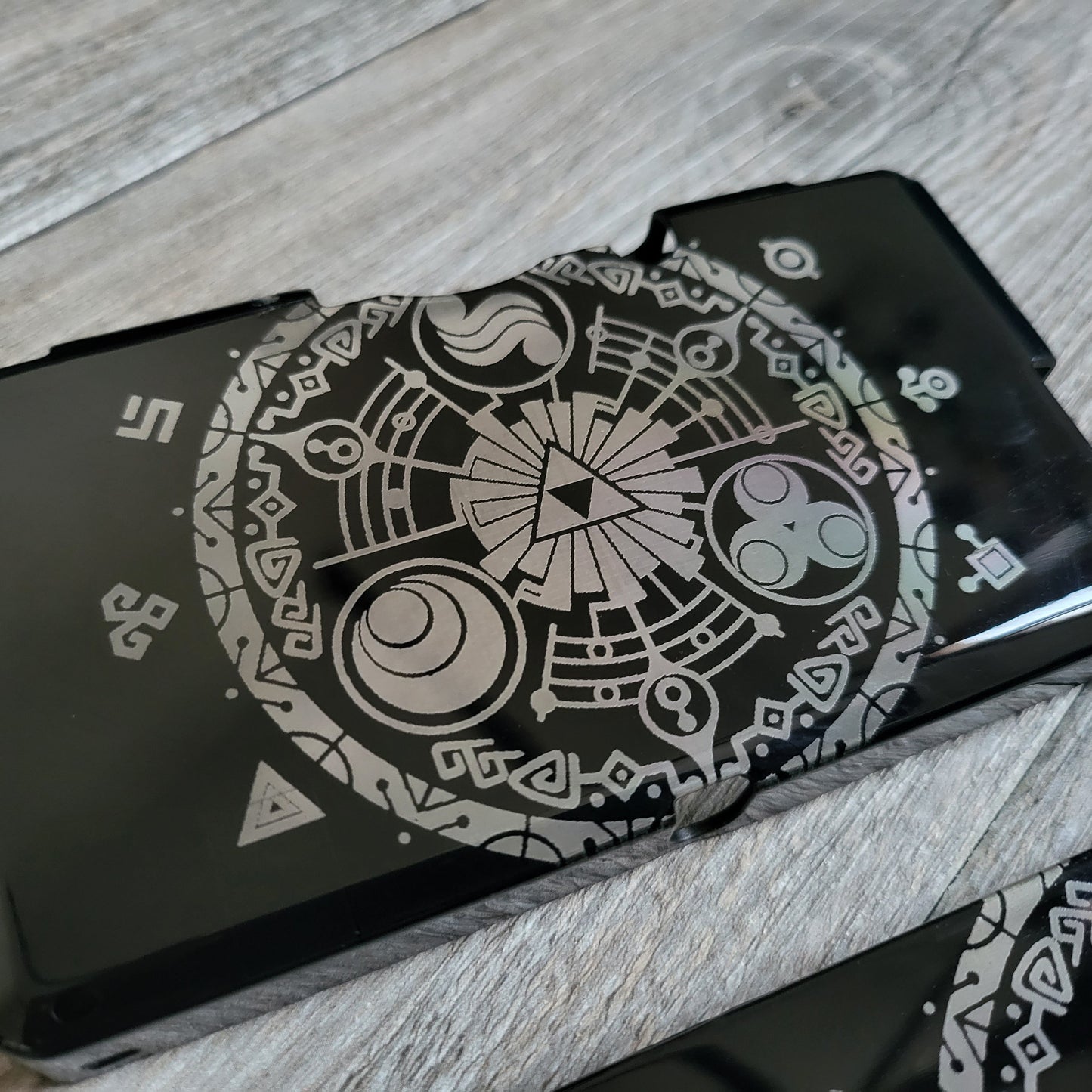 Custom shell cover for Nintendo with Zelda themed laser engravings