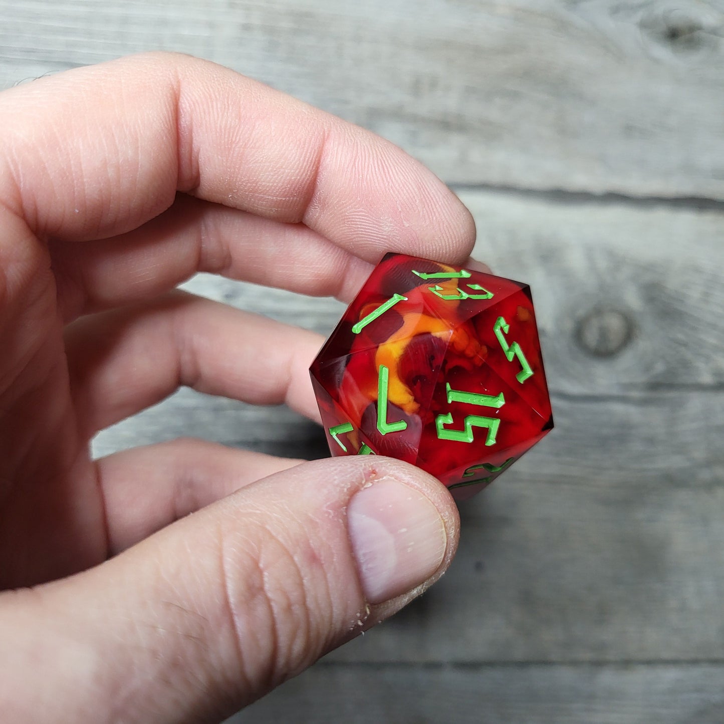 D20 dice in 33 mm format with skull inside for role-playing games for Dungeons and Dragons