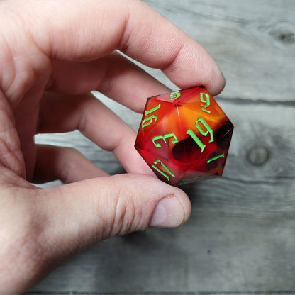 D20 dice in 33 mm format with skull inside for role-playing games for Dungeons and Dragons