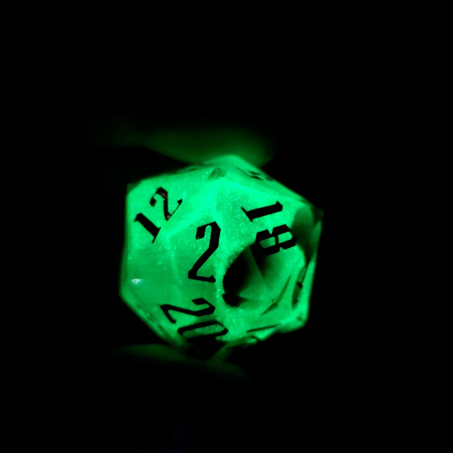 D20 dice in 33 mm format with skull inside for role-playing games for Dungeons and Dragons