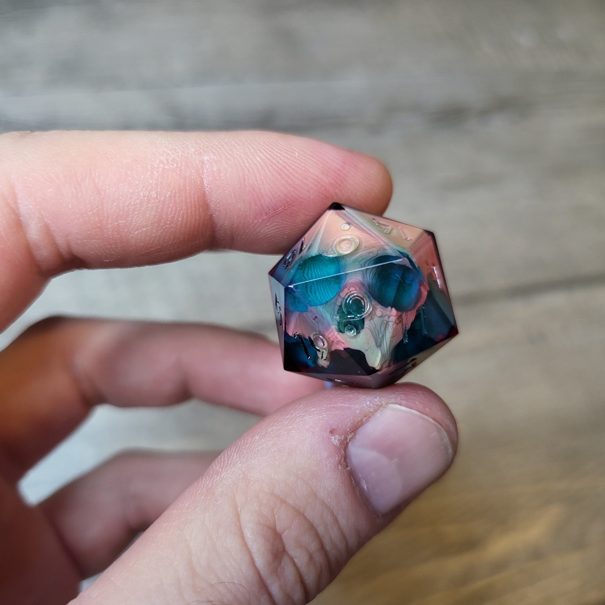 Dice D20 with skull inside for role playing for Dungeons and Dragons