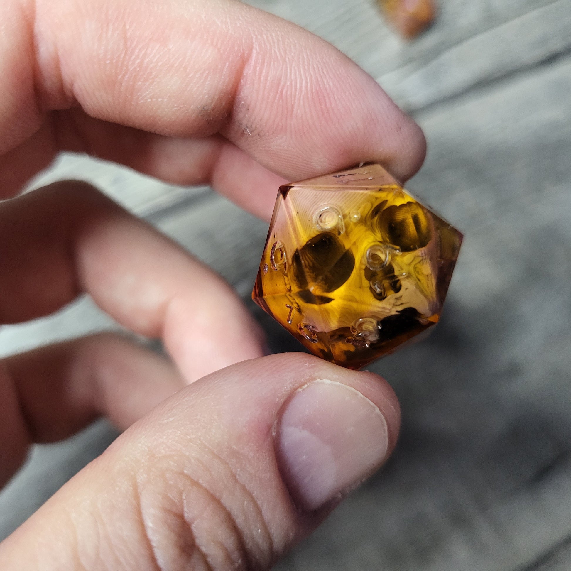 Dice D20 with skull inside for role playing for Dungeons and Dragons