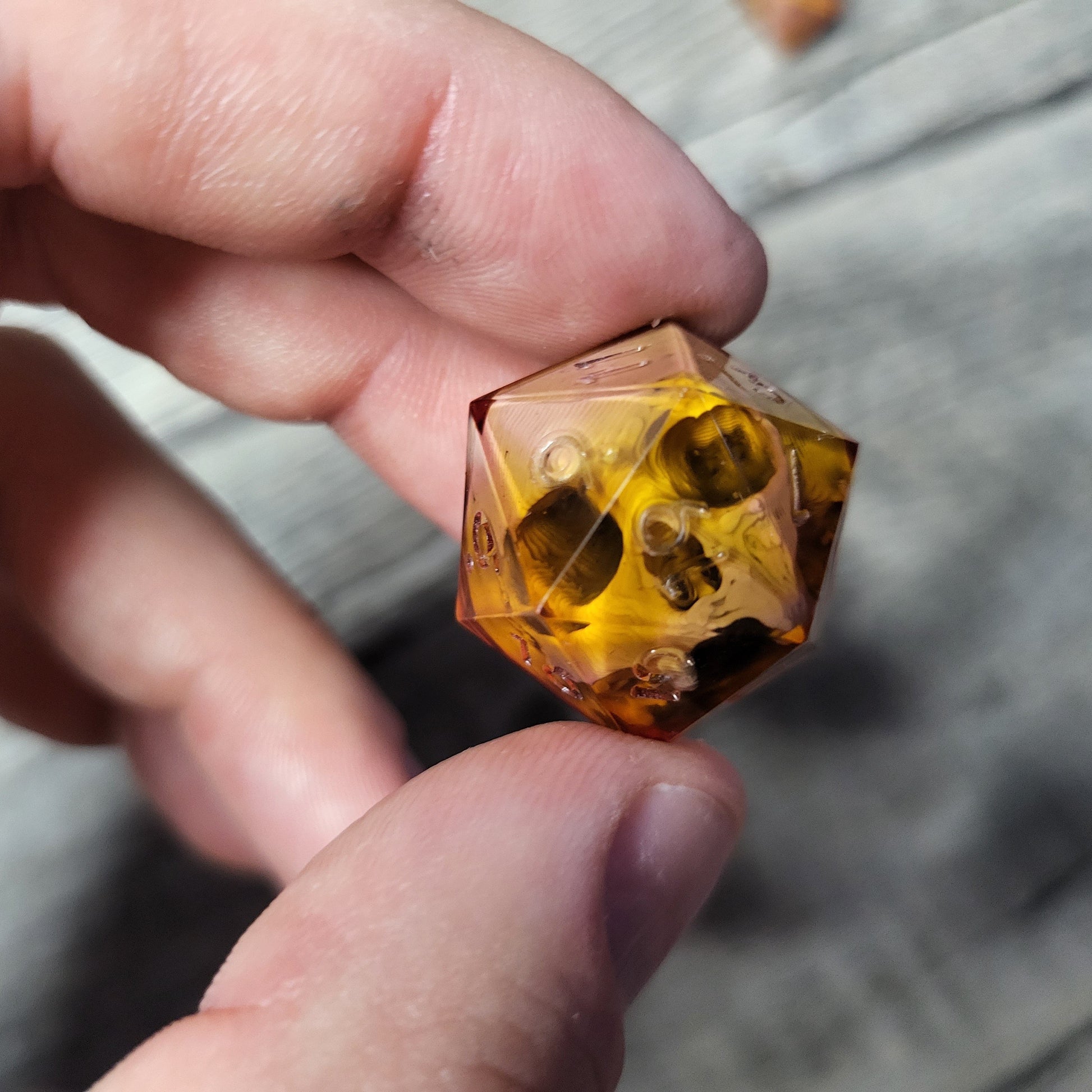 Dice D20 with skull inside for role playing for Dungeons and Dragons