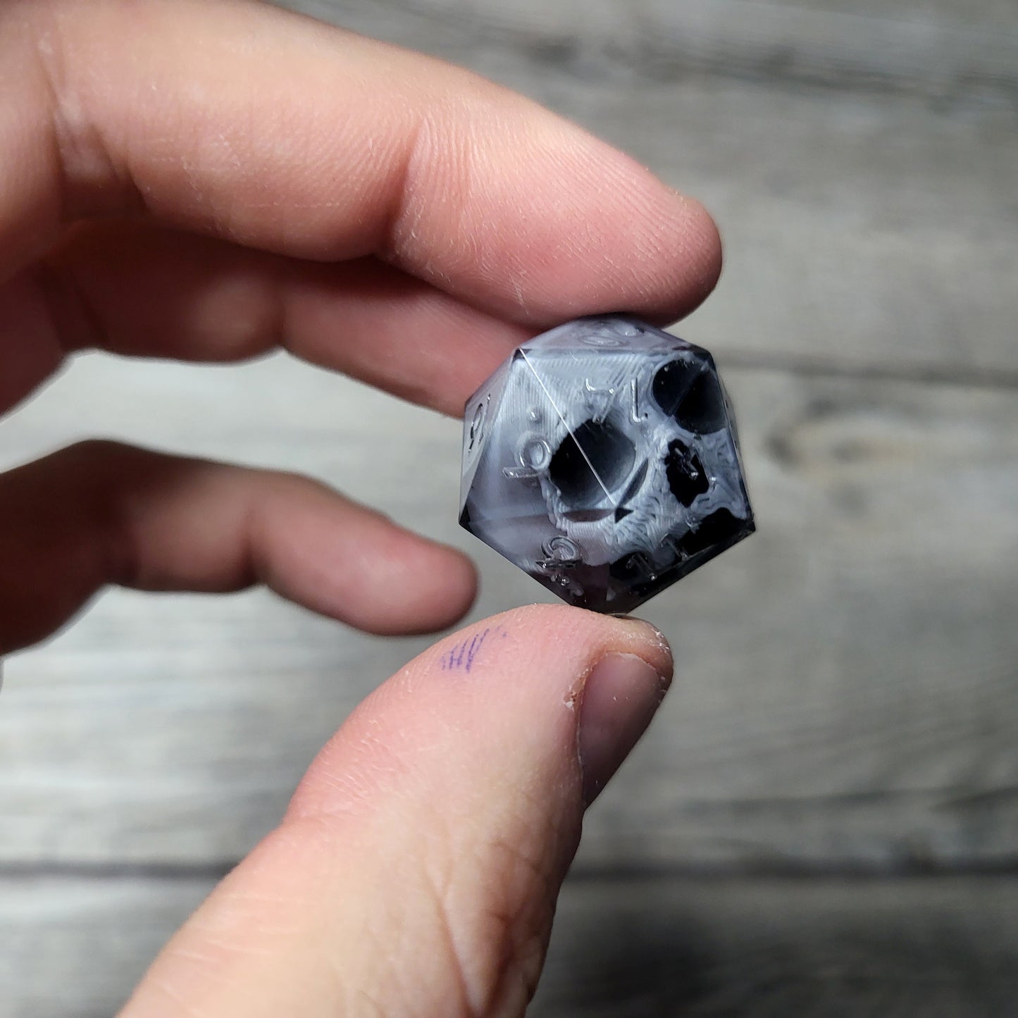 Dice D20 with skull inside for role playing for Dungeons and Dragons