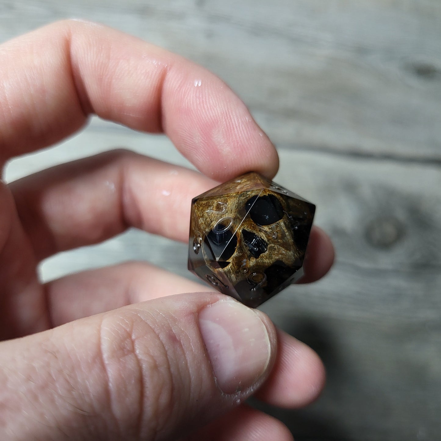 Dice D20 with skull inside for role playing for Dungeons and Dragons