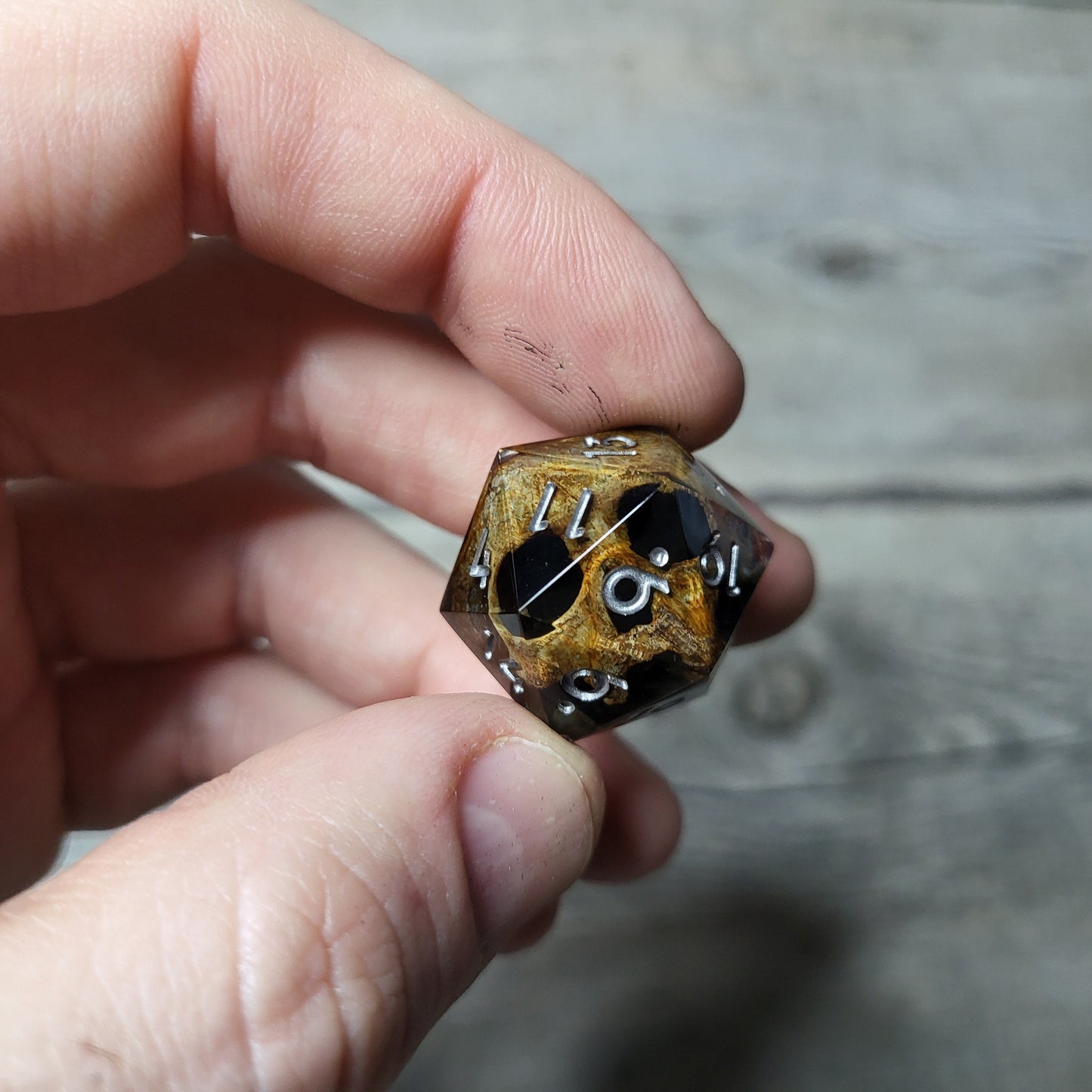 Dice D20 with skull inside for role playing for Dungeons and Dragons