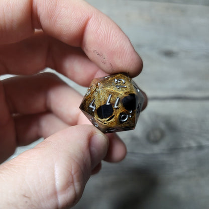 Dice D20 with skull inside for role playing for Dungeons and Dragons