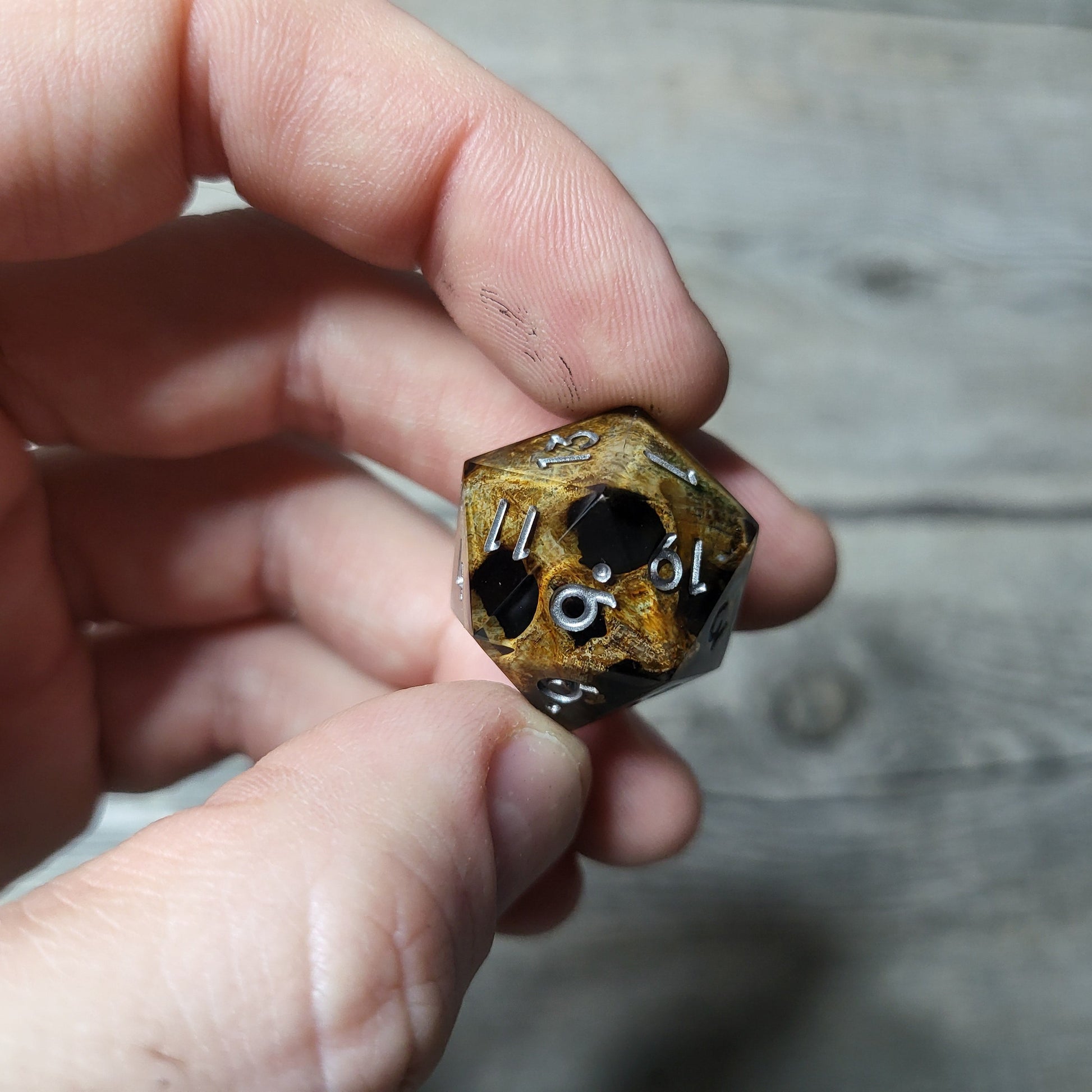 Dice D20 with skull inside for role playing for Dungeons and Dragons