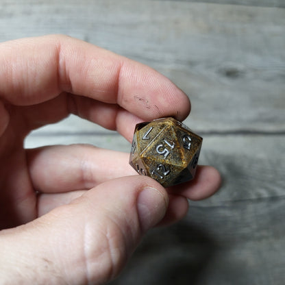 Dice D20 with skull inside for role playing for Dungeons and Dragons