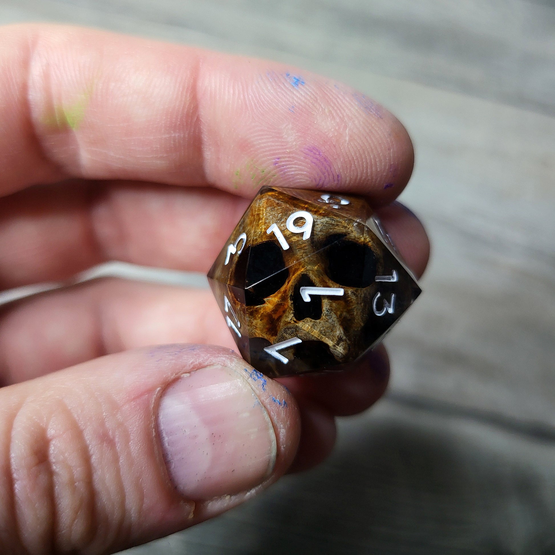 Dice D20 with skull inside for role playing for Dungeons and Dragons