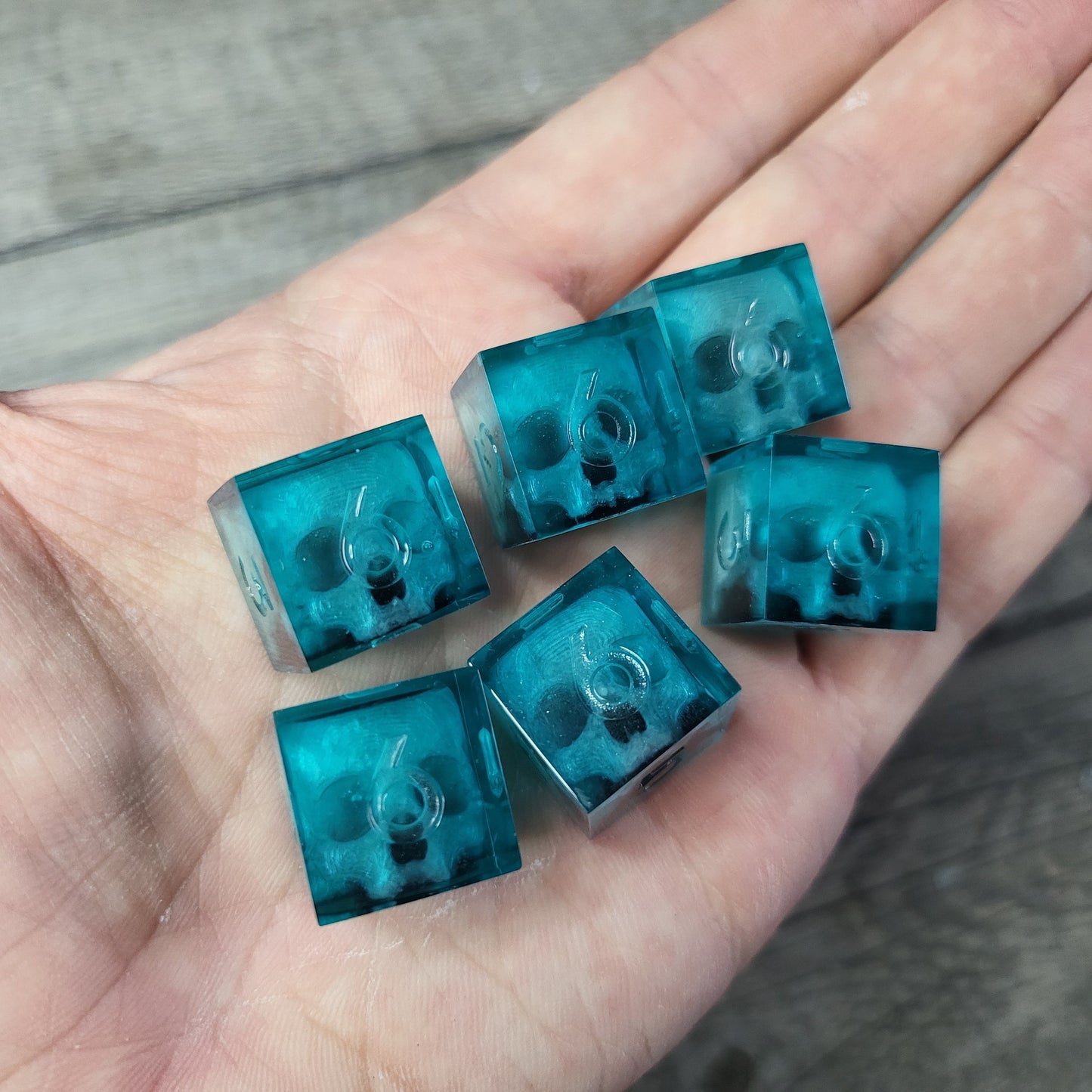 Dice set in D6 format with skull inside for role-playing games for Dungeons and Dragons