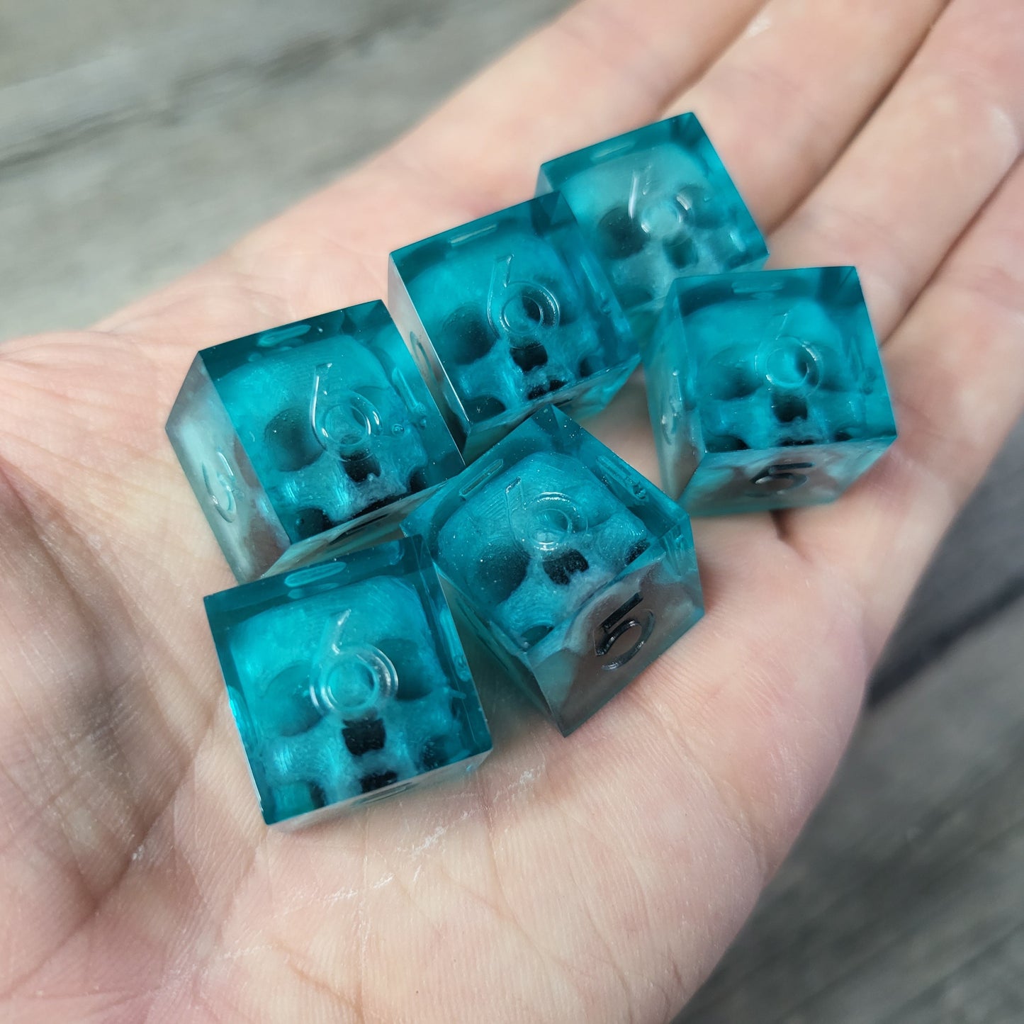 Dice set in D6 format with skull inside for role-playing games for Dungeons and Dragons