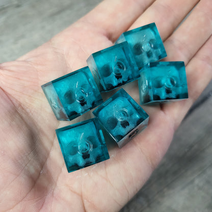 Dice set in D6 format with skull inside for role-playing games for Dungeons and Dragons