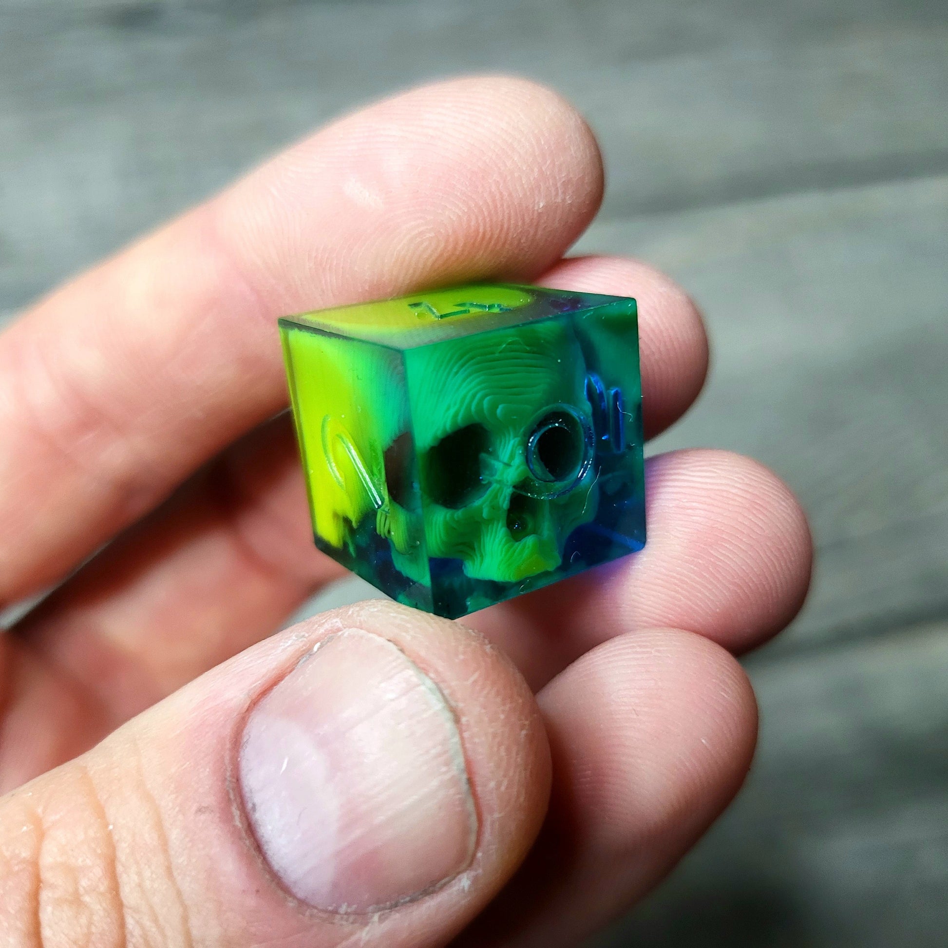 Dice set in D6 format with skull inside for role-playing games for Dungeons and Dragons