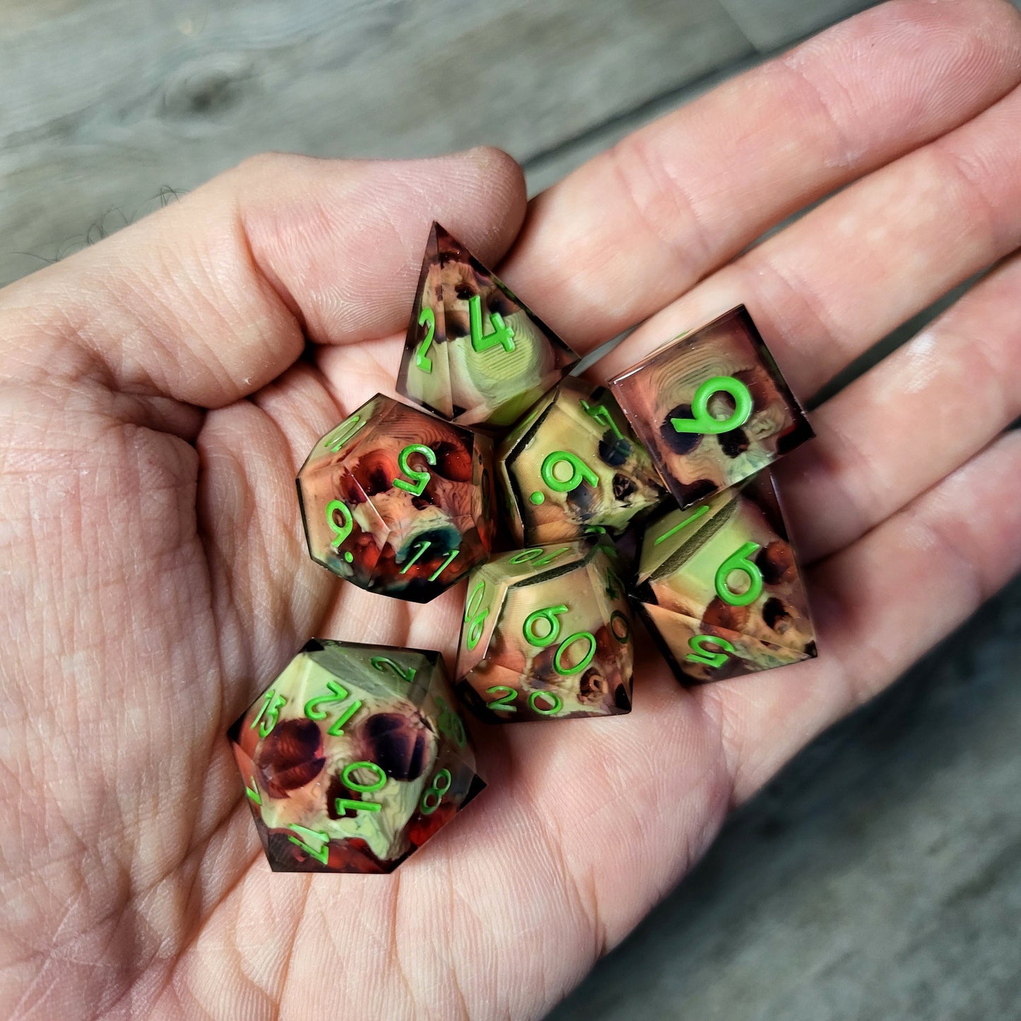 Dice set with 7 pieces with skull inside for role-playing games for Dungeons and Dragons