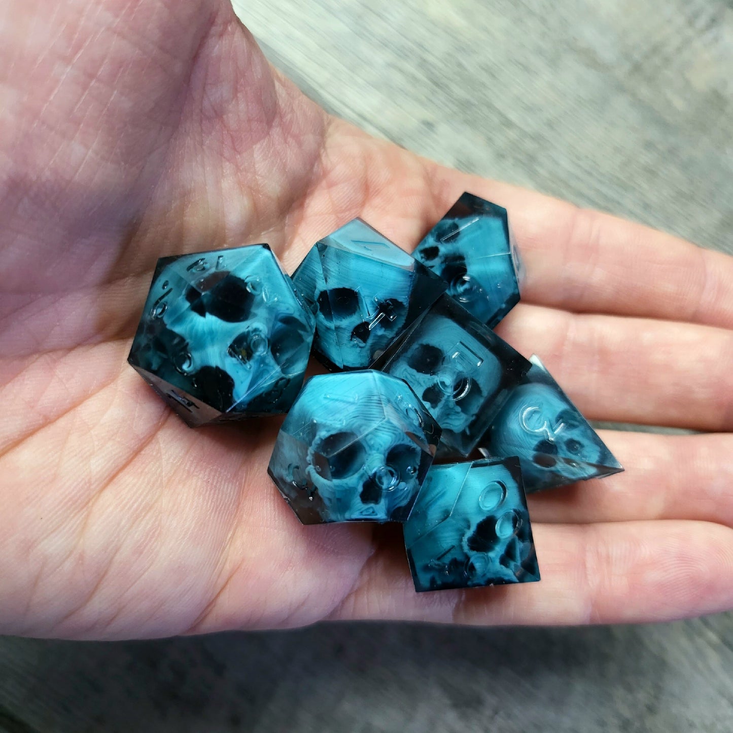 Dice set with 7 pieces with skull inside for role-playing games for Dungeons and Dragons