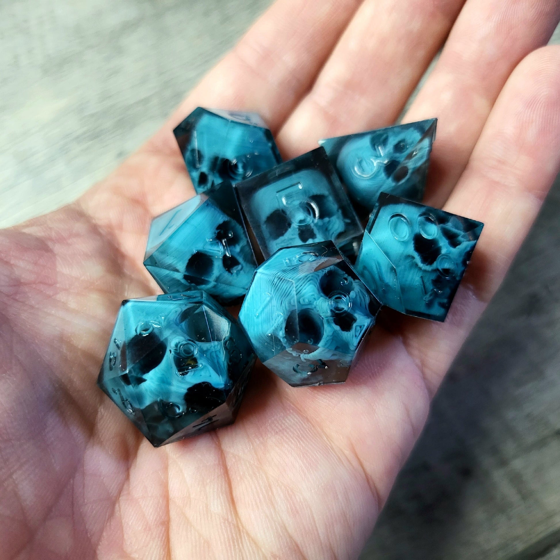 Dice set with 7 pieces with skull inside for role-playing games for Dungeons and Dragons