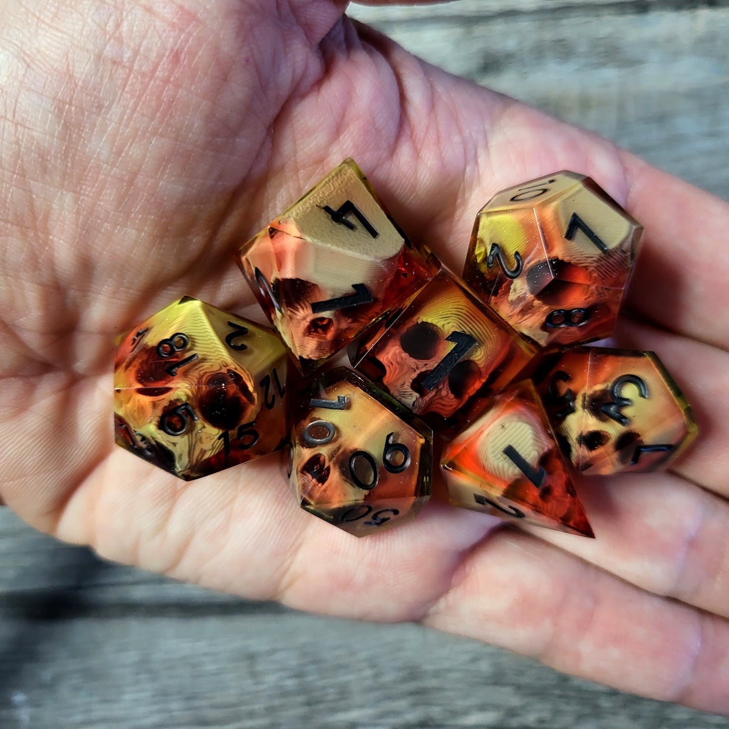 Dice set with 7 pieces with skull inside for role-playing games for Dungeons and Dragons