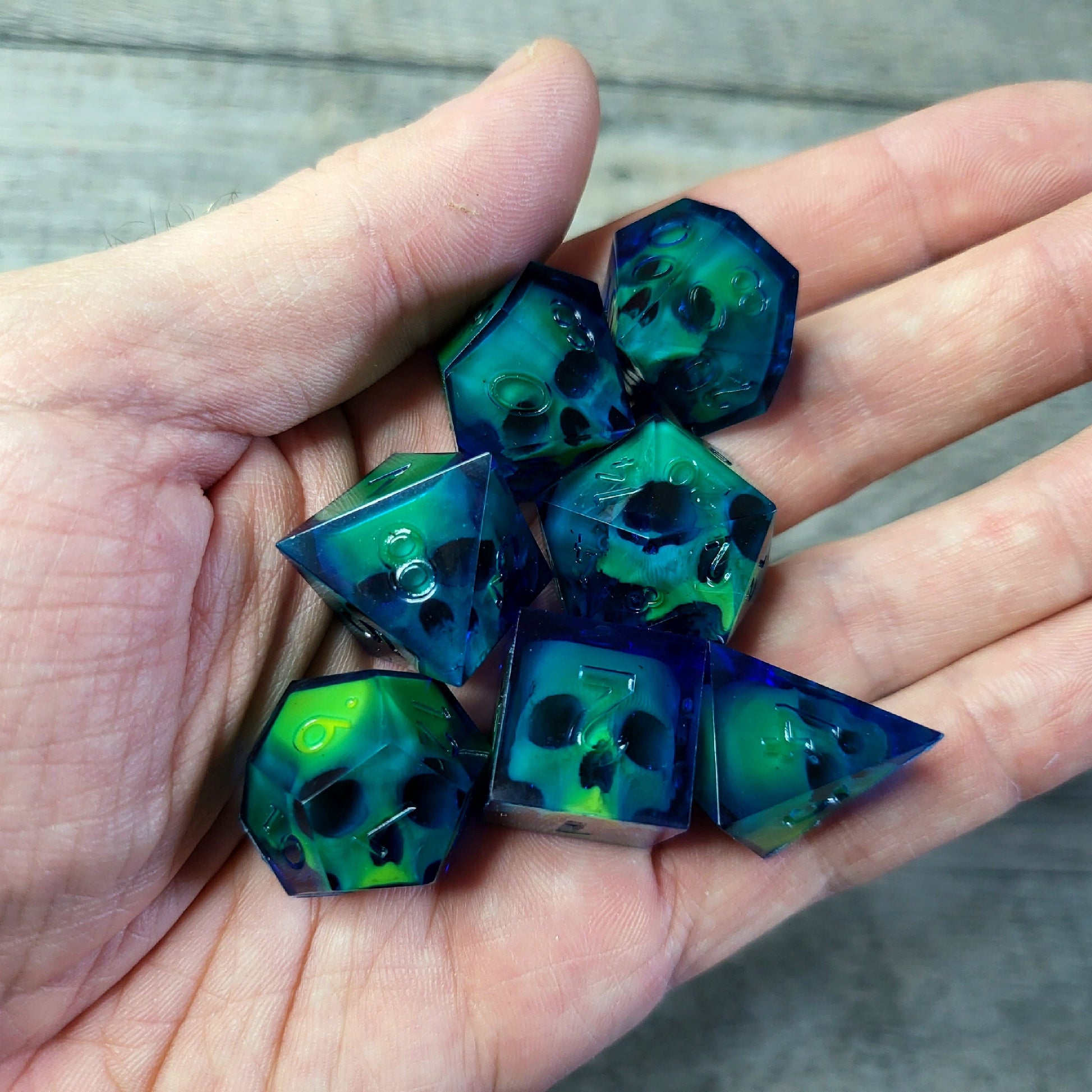 Dice set with 7 pieces with skull inside for role-playing games for Dungeons and Dragons