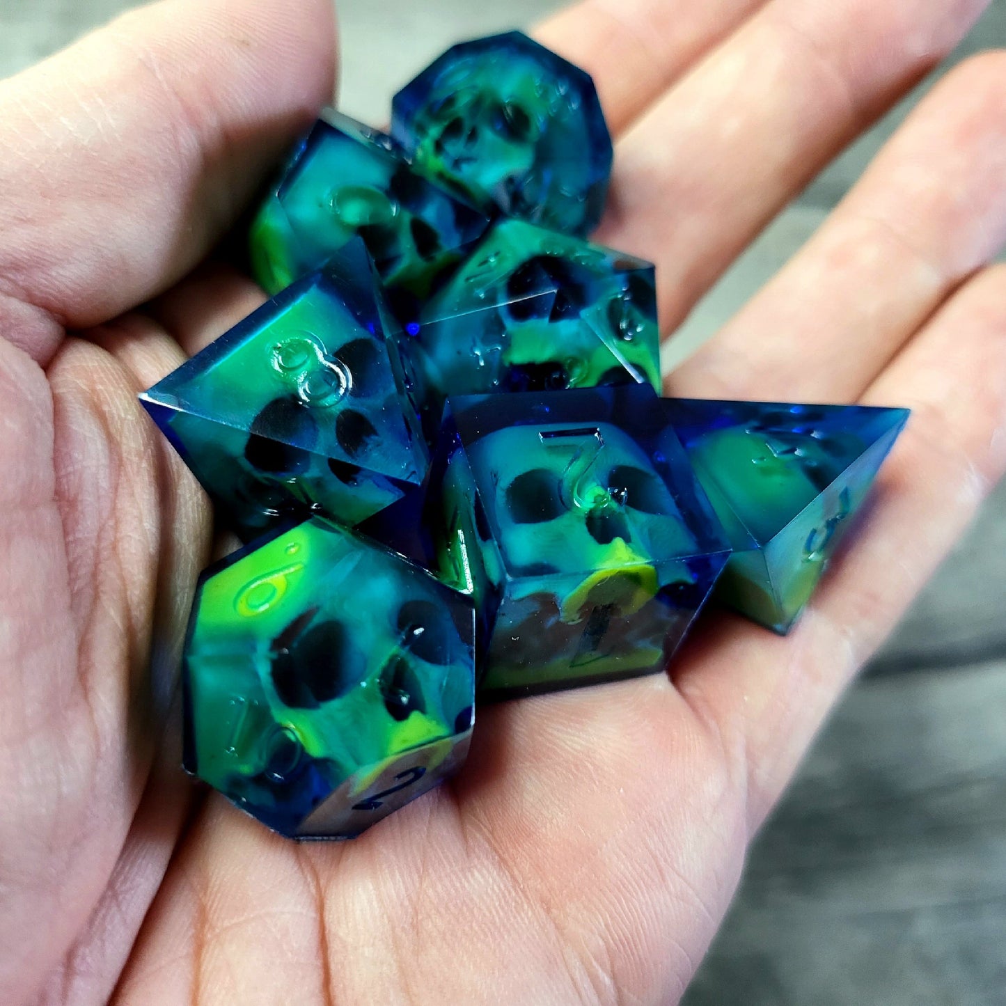 Dice set with 7 pieces with skull inside for role-playing games for Dungeons and Dragons