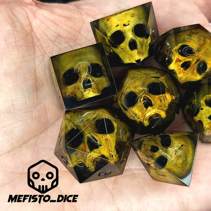 Black resin DnD dice set with detailed yellow skulls inside
