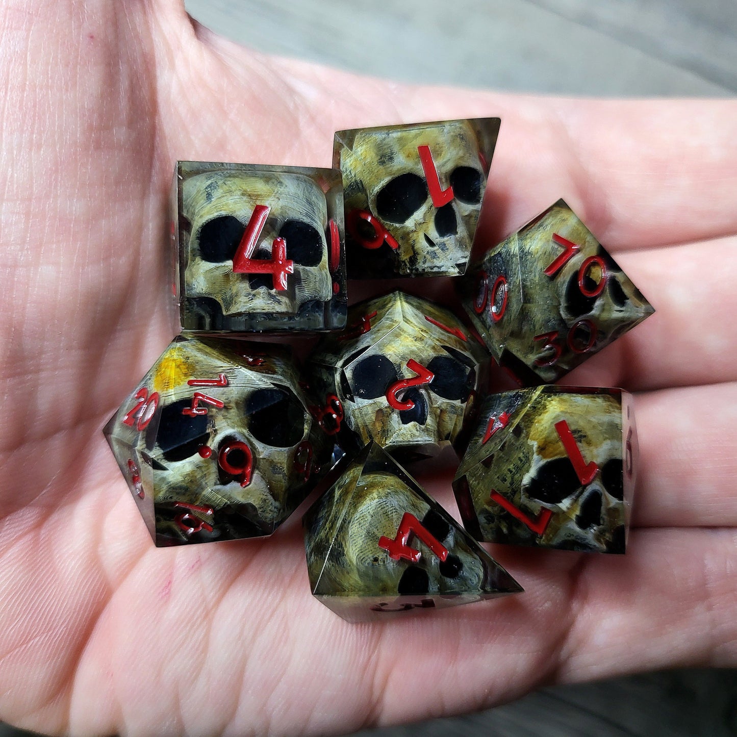 Dice set with 7 pieces with skull inside for role-playing games for Dungeons and Dragons