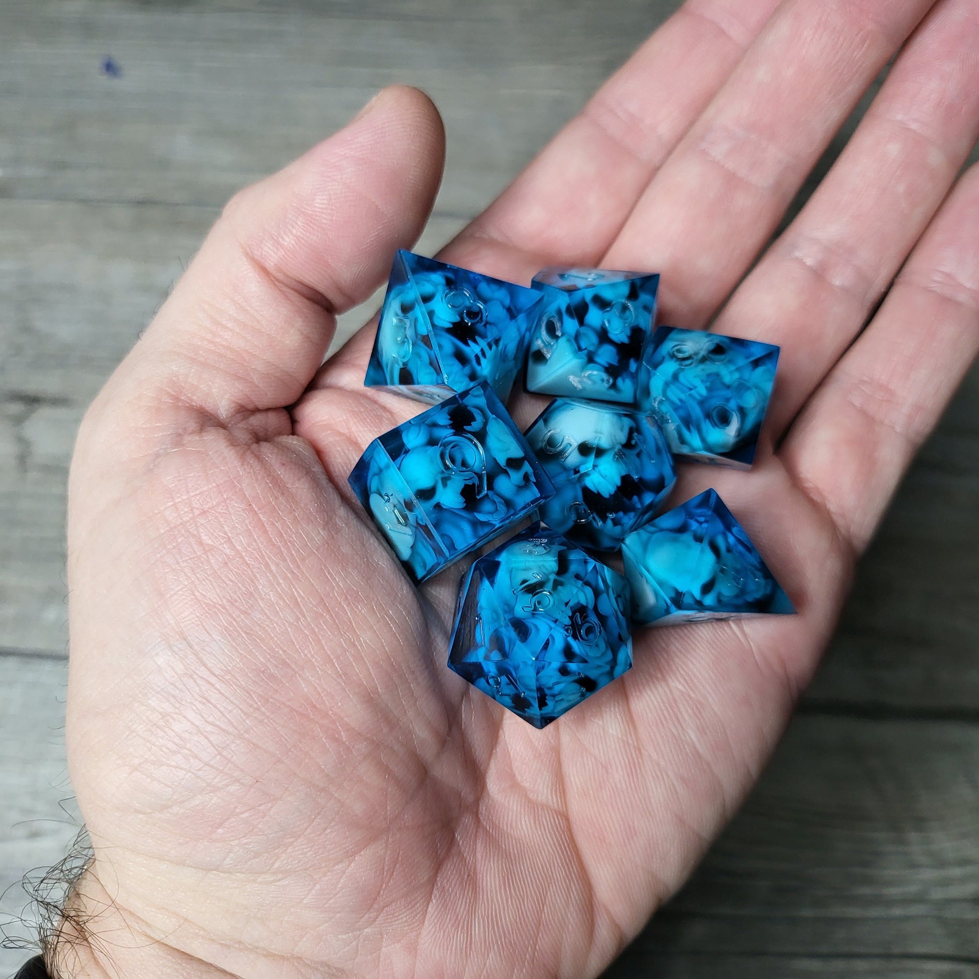 Dice set with 7 pieces with skull inside in spirit theme for role-playing games for Dungeons and Dragons