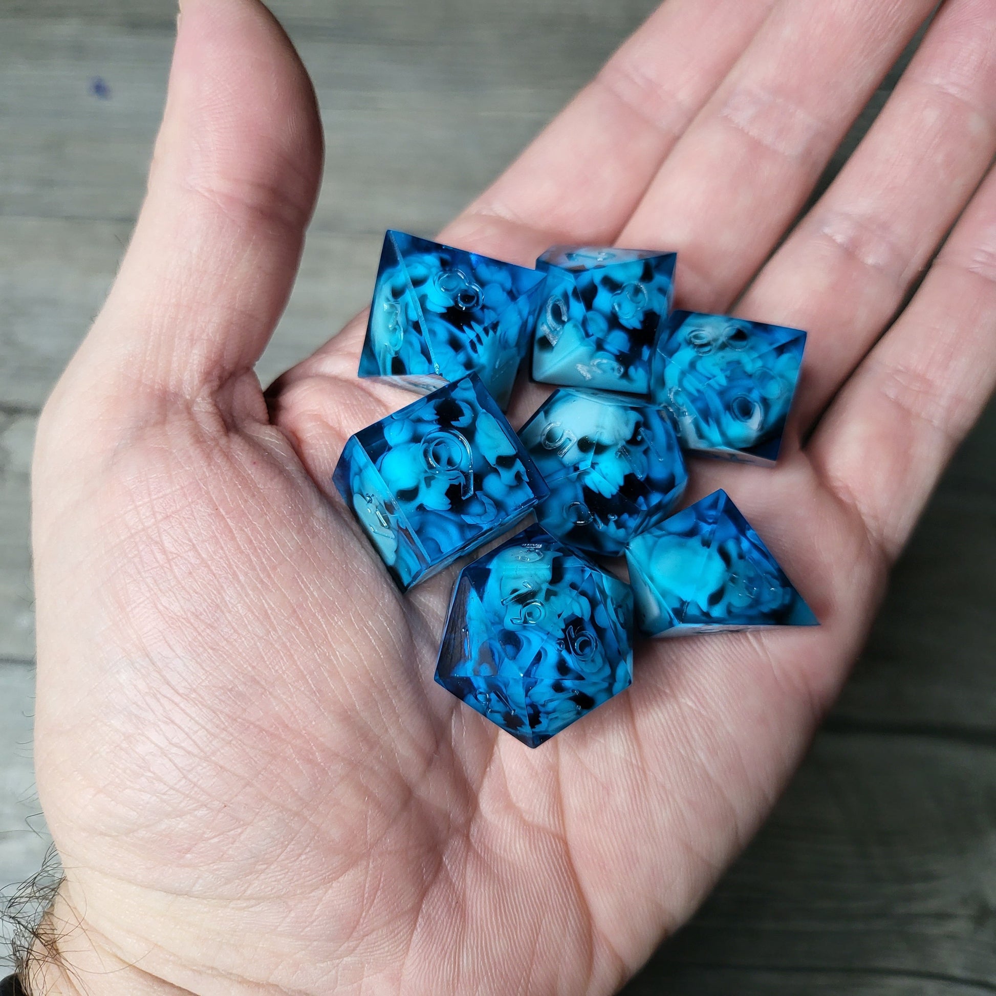 Dice set with 7 pieces with skull inside in spirit theme for role-playing games for Dungeons and Dragons