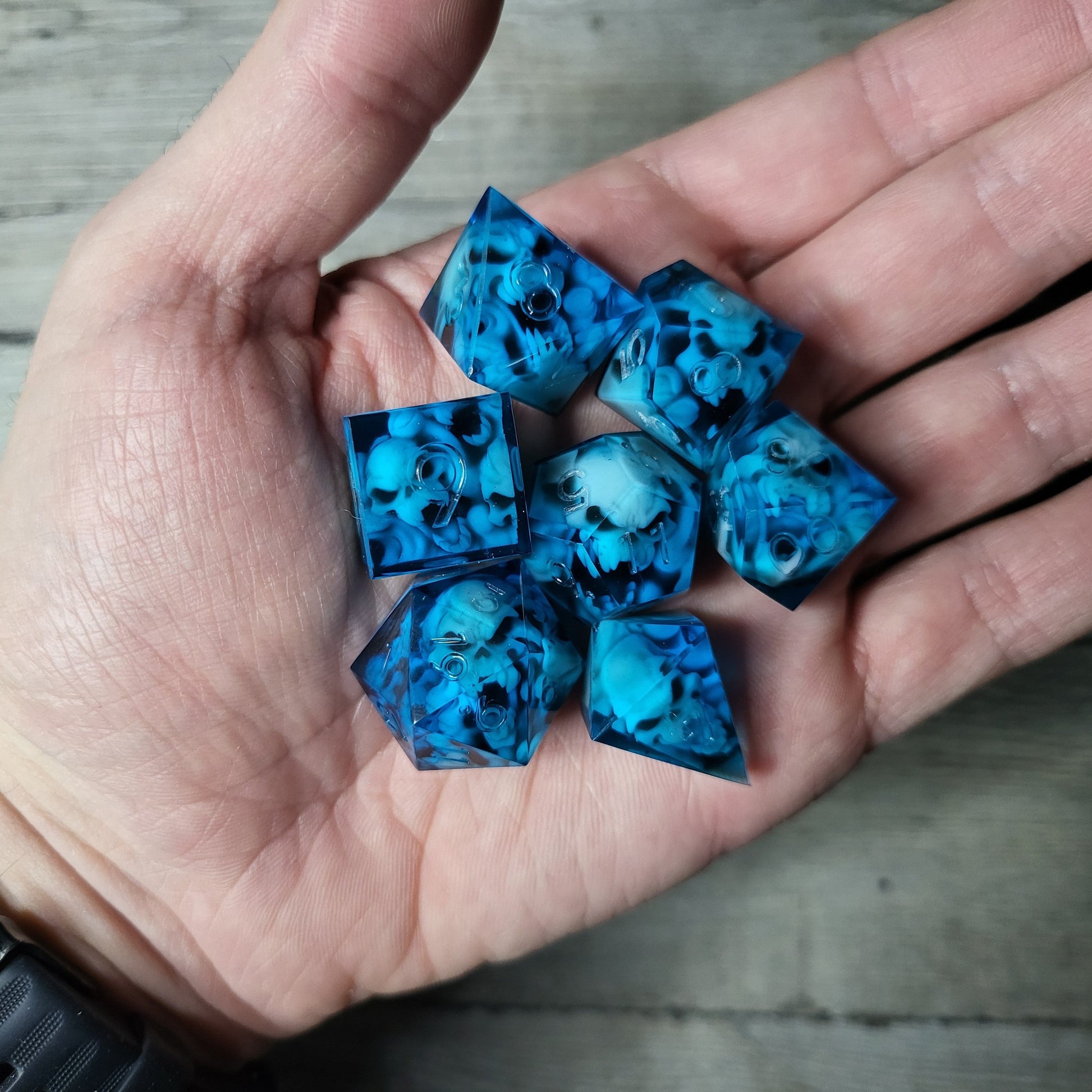 Dice set with 7 pieces with skull inside in spirit theme for role-playing games for Dungeons and Dragons