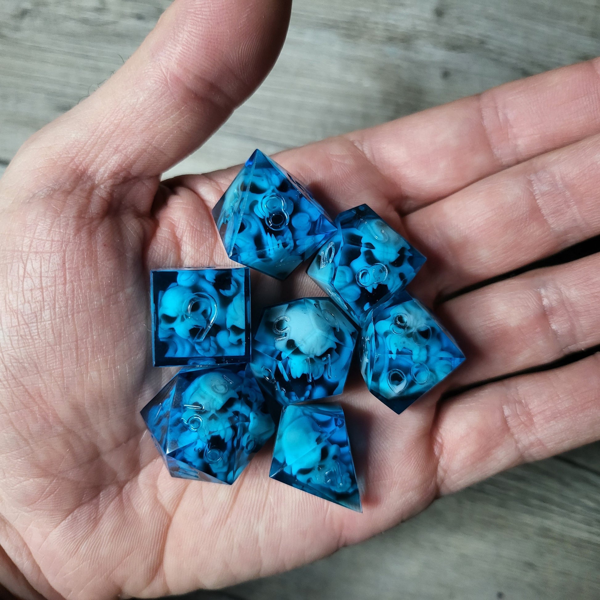 Dice set with 7 pieces with skull inside in spirit theme for role-playing games for Dungeons and Dragons