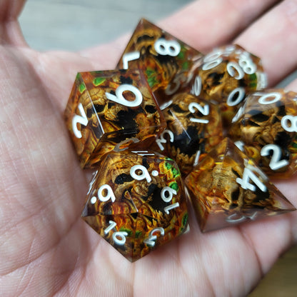 Dice set with 7 pieces with skull inside in spirit theme for role-playing games for Dungeons and Dragons