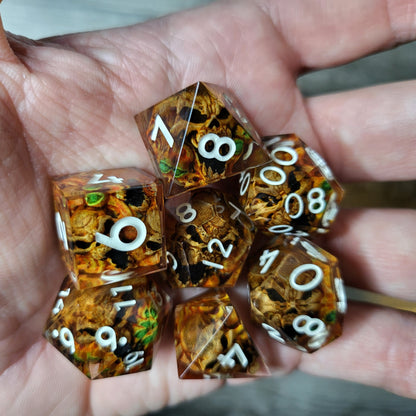 Dice set with 7 pieces with skull inside in spirit theme for role-playing games for Dungeons and Dragons