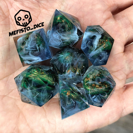 Clear resin DnD dice set with green and gold tentacles inside surrounded by white smoke effects