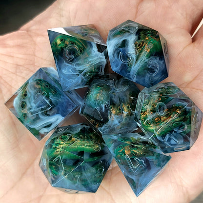 Clear resin DnD dice set with green and gold tentacles inside surrounded by white smoke effects