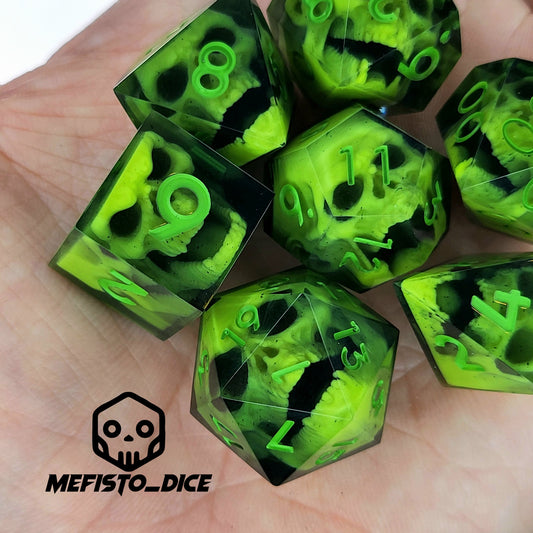 Close-up of black resin dice with neon-green undead zombie skulls and bright green numbers, handcrafted by Mefisto_Dice.