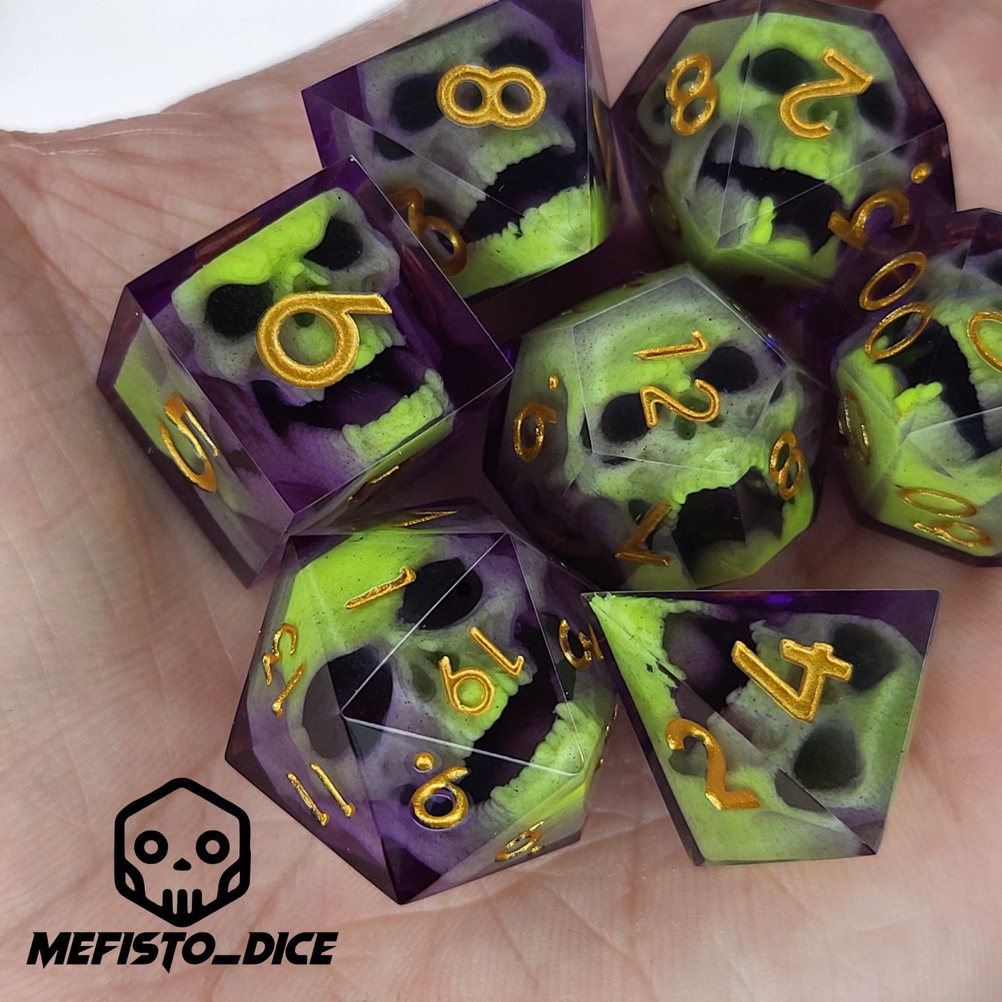 Close-up of purple resin dice with acid-green undead zombie skulls and gold numbers, handcrafted by Mefisto_Dice