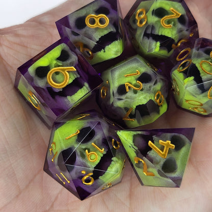 Close-up of purple resin dice with acid-green undead zombie skulls and gold numbers, handcrafted by Mefisto_Dice