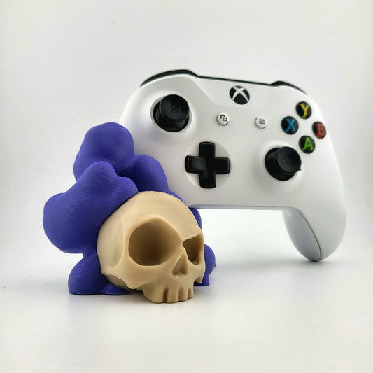 One xbox controller stand featuring a skull design and purple smoke, 3D printed  with high-quality PLA.