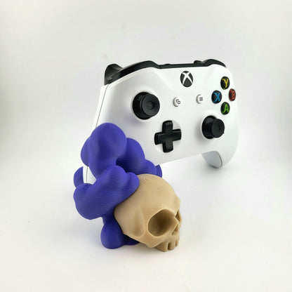 One xbox controller stand featuring a skull design and purple smoke, 3D printed  with high-quality PLA.