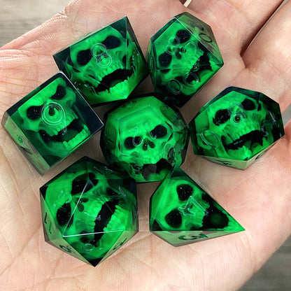 Black resin DnD dice set with bright green zombie skulls inside