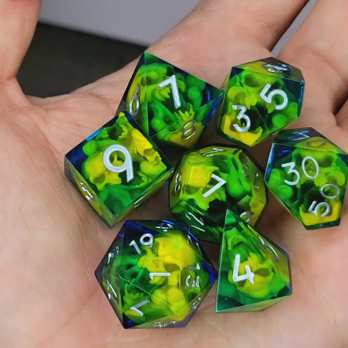 Dice set with yellow spirit inside and silver numbers for play dnd , dungeons and dragons