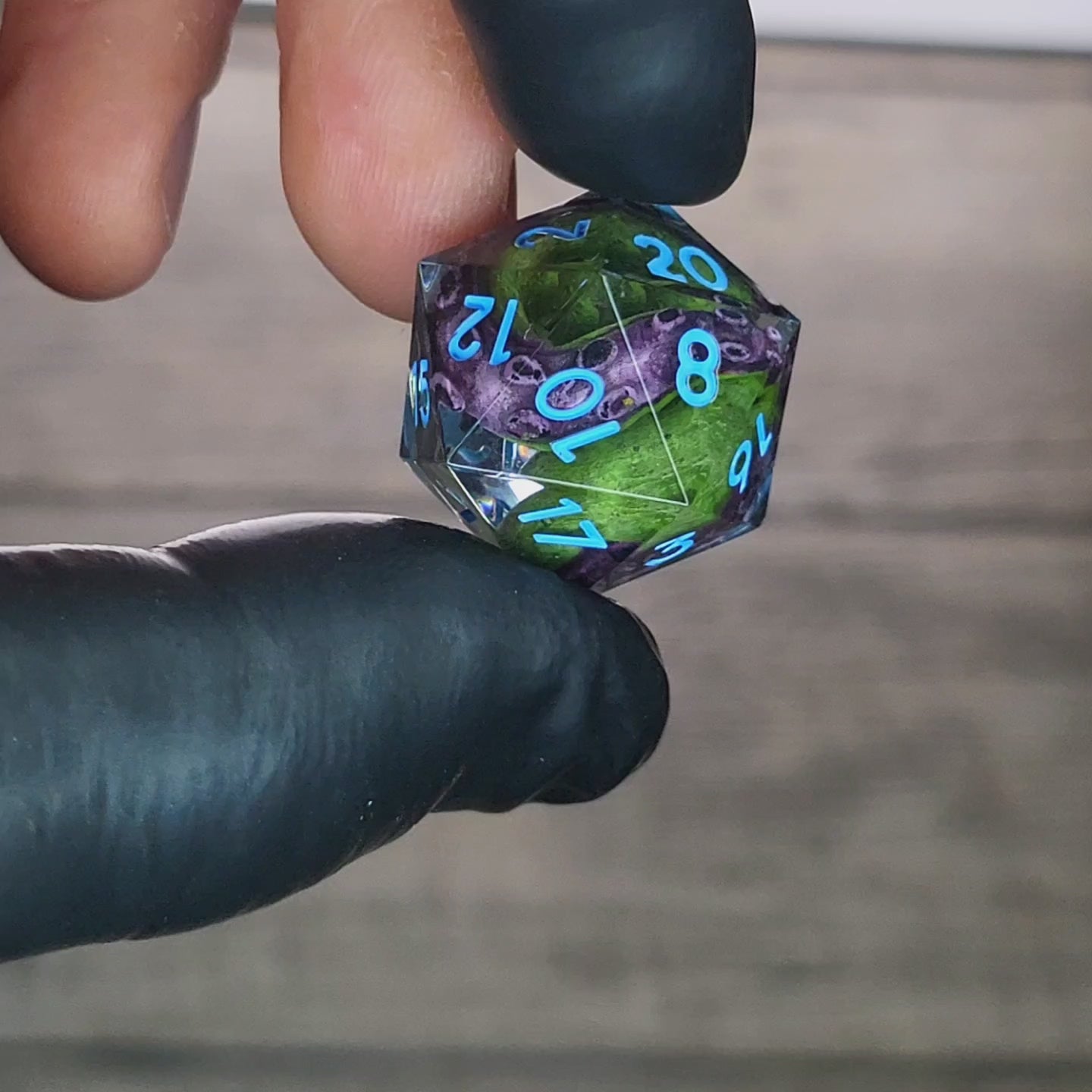 D20 dice with green tentacles inside and blue numbers for play dnd , dungeons and dragons , Call of Cthulhu